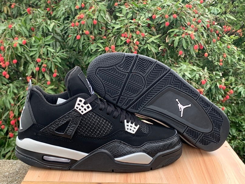 Air Jordan 4 'Spotlight' Sneakers - Black and White