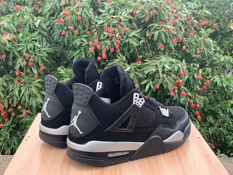 Air Jordan 4 'Spotlight' Sneakers - Black and White