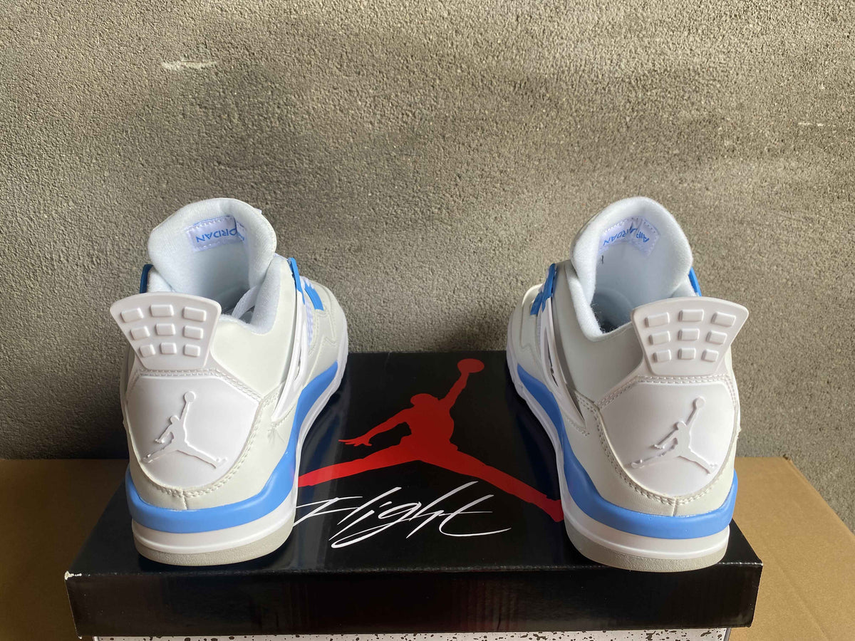 Air Jordan 4 Sneakers - Cream and Light Blue