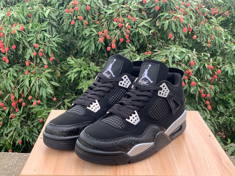Air Jordan 4 'Spotlight' Sneakers - Black and White
